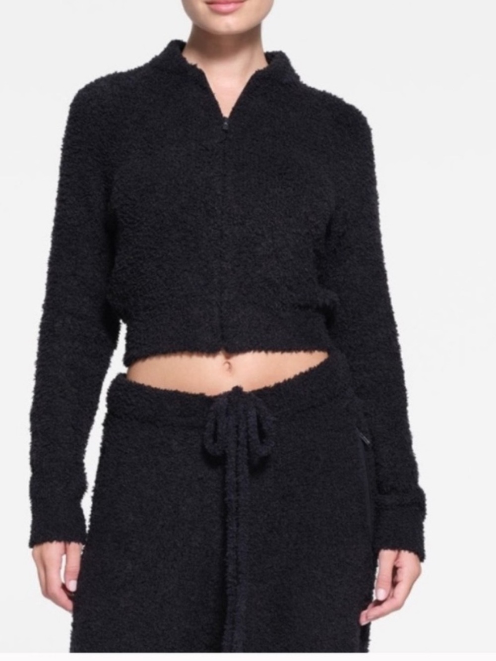 Skims Black cozy knit cropped zip up